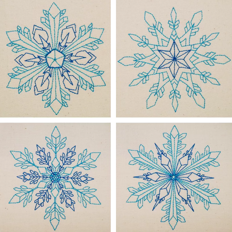 Vier Schneeflocken zweifarbig in Linienoptik 5-8